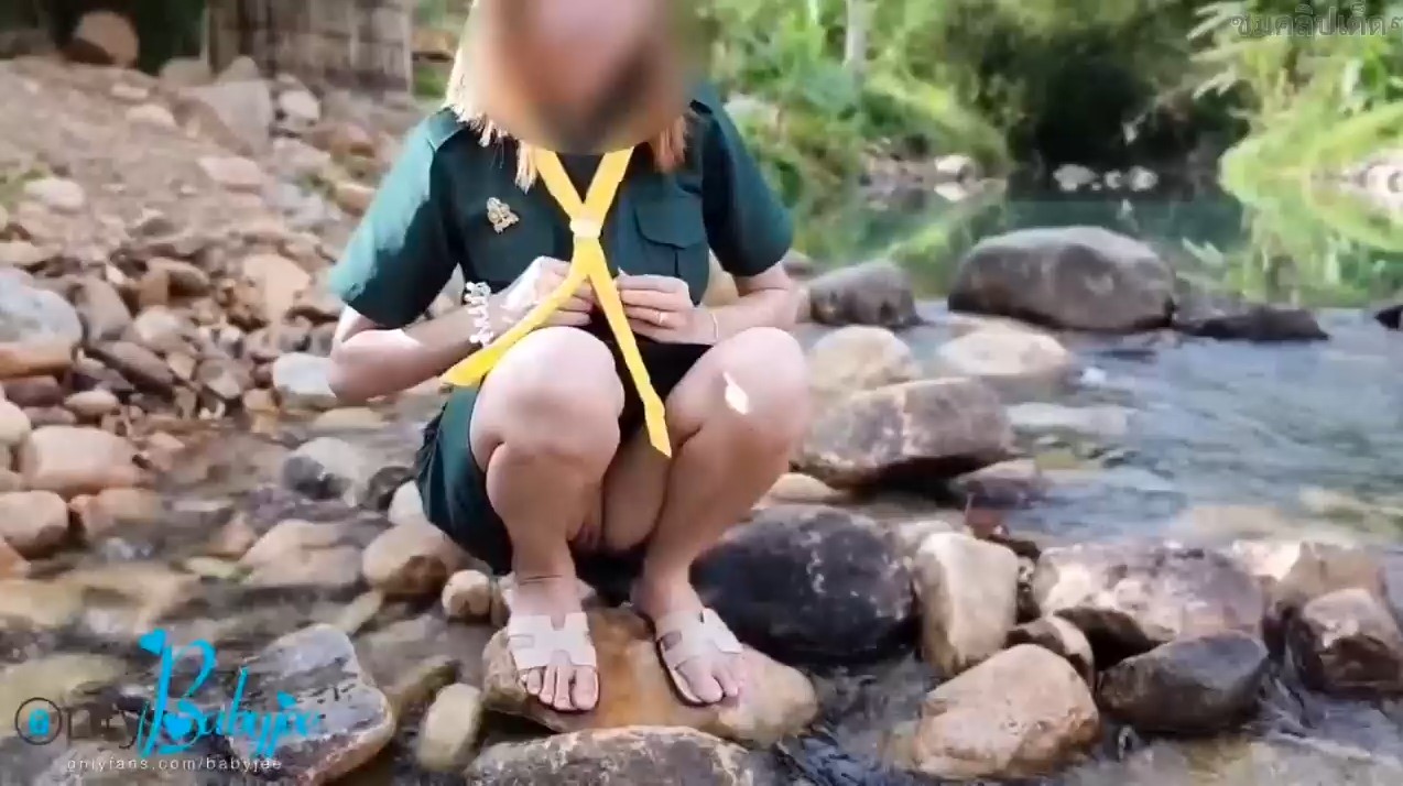 Clip of Thai child babyjee wearing a national costume to go camping.